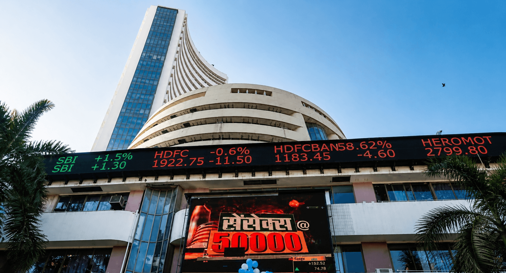 Sensex, Nifty close lower as record-low rupee, oil worries weigh on markets